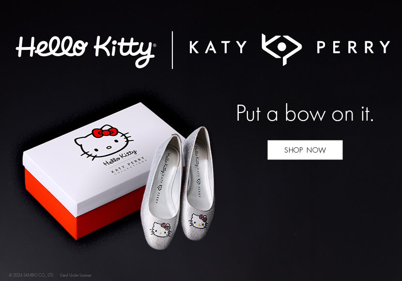 Hello Kitty/Katy Perry Collections collaboration, Put a Bow On It.  Silver rhinestone Hello Kitty / Katy Perry Collection shoes sitting on a shoebox