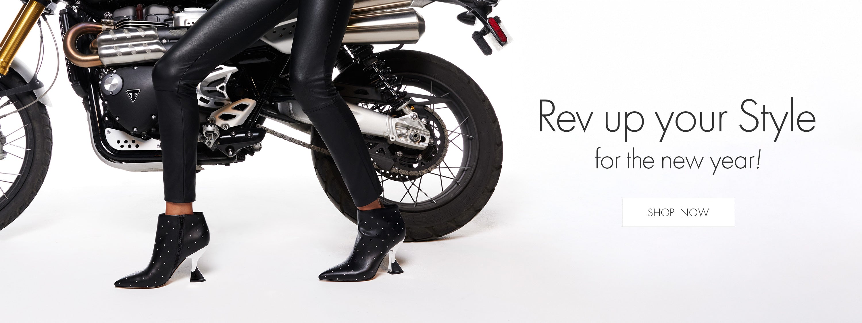 Rev Up Your Style for the New Year. A picture of boots with a motorcycle